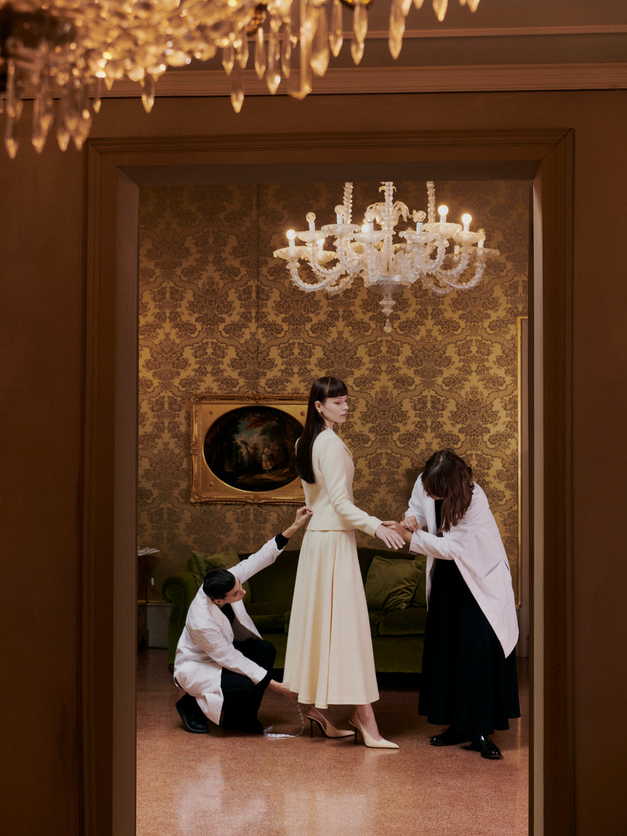 Clients are guided through the House’s silhouettes to compose an elevated wardrobe, each piece individually crafted through the Atelier’s couture service.